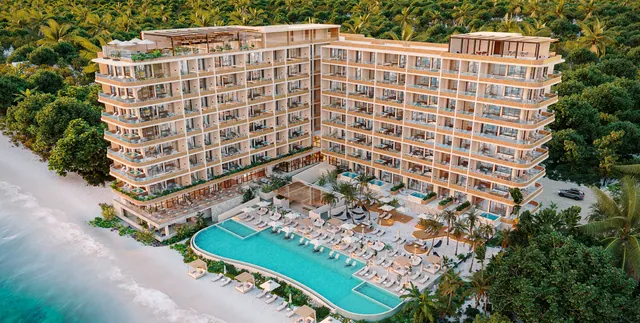 Aerial view of INNA Beach Condos and Hotel on the Puerto Morelos shoreline